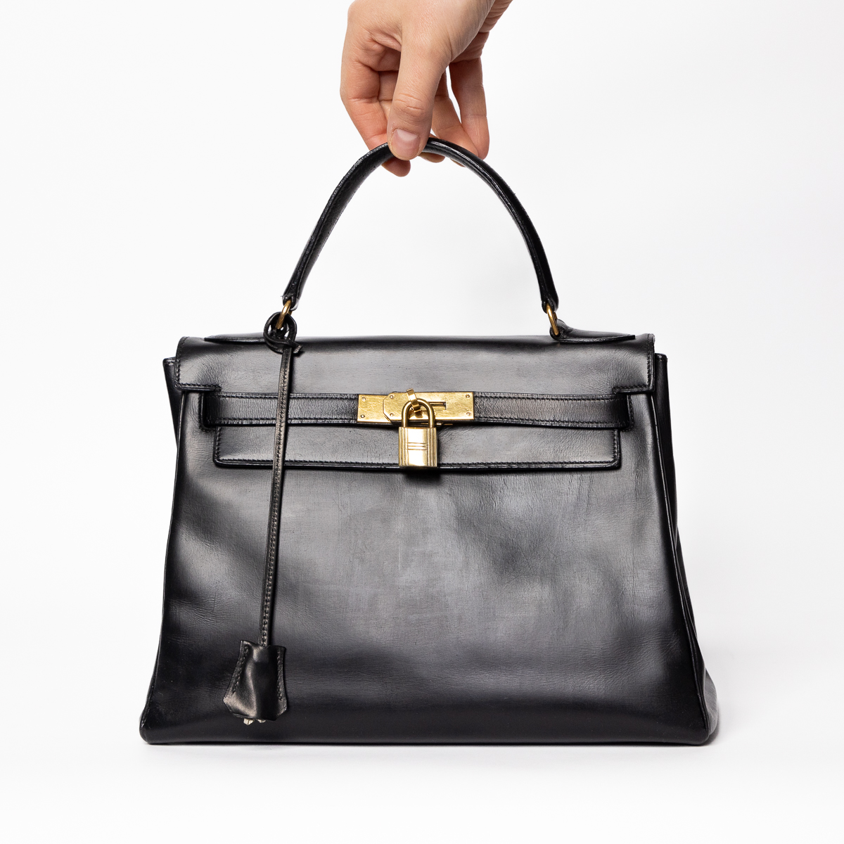 Hermès Kelly Retourne 28 box leather black with gold hardware